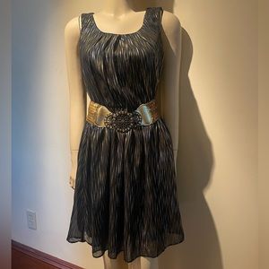 Fun Gold Silver and black mini dress with a sequin gold belt.